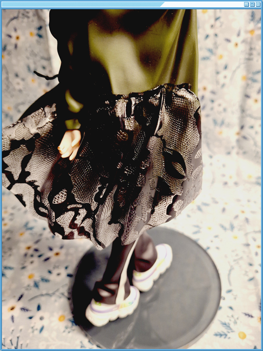 Focus on her overall outfit