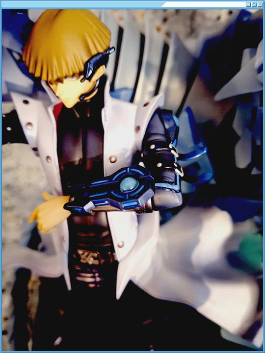 Overhead view of Kaiba, looking at the Duel Disk